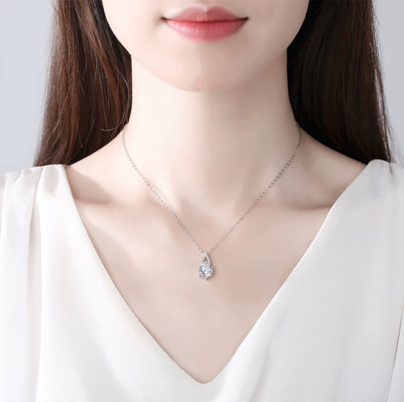 The six-prong synthetic gem necklace is custom made of quality that touches the heart